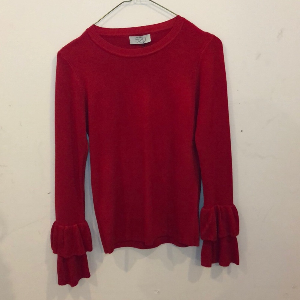 529 long sleeve ruffle cuff knit top.